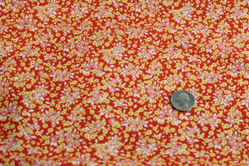 catalog photo of 70s vintage fabric, retro poly knit w/ tiny floral print tangerine orange & lemon yellow