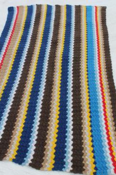 catalog photo of 70s vintage handmade crochet rug, boho stripes in retro urban mod colors