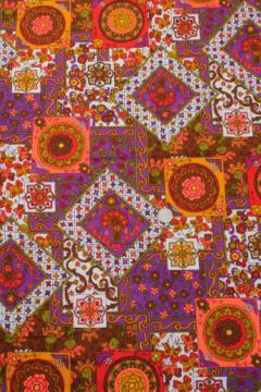 catalog photo of 70s vintage hippie boho cotton crinkle fabric, retro patchwork print w/ neon colors