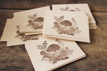 catalog photo of 70s vintage mushrooms print note paper stationery, sepia tone brown monochrome