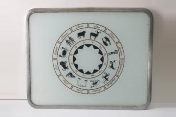 catalog photo of 70s vintage zodiac design glass cutting board, kitchen counter saver 