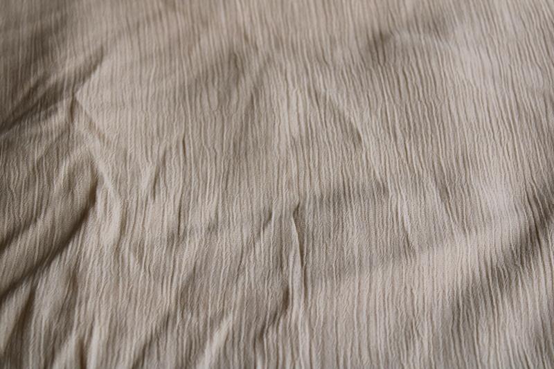 photo of 80s 90s vintage rayon blend crinkle fabric, warm tan latte solid color #1