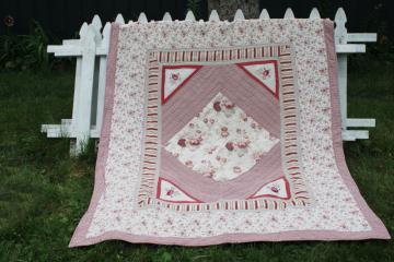 catalog photo of 90s vintage cotton quilt, country floral prints soft faded red & rose pink