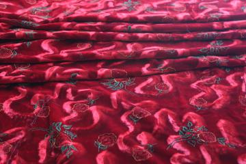 catalog photo of 90s vintage fabric, crimson crushed velvet w/ floral in machine embroidery