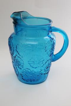 catalog photo of Anchor Hocking Springflower laser blue glass pitcher, embossed daisy flower pattern