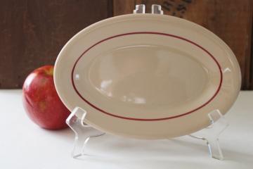 catalog photo of Arrowhead pattern vintage Shenango China oval plate, plain red band on Inca Ware tan ironstone 