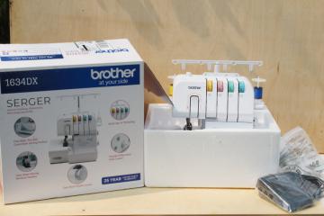 catalog photo of Brother 1634DX four thread serger sewing machine in original box, never used