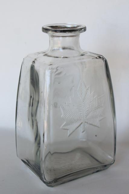 photo of Canada maple leaf vintage embossed glass liquor bottle decanter McNaughton whiskey #1