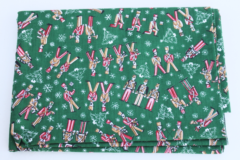 photo of Christmas print quilting weight cotton fabric, parade of the wooden soldiers on green #1