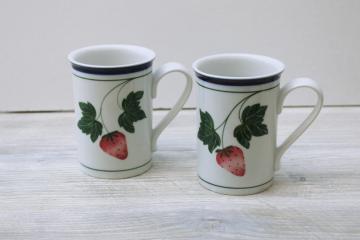 catalog photo of Dansk Berries strawberry pattern blue band white china mugs or coffee cups