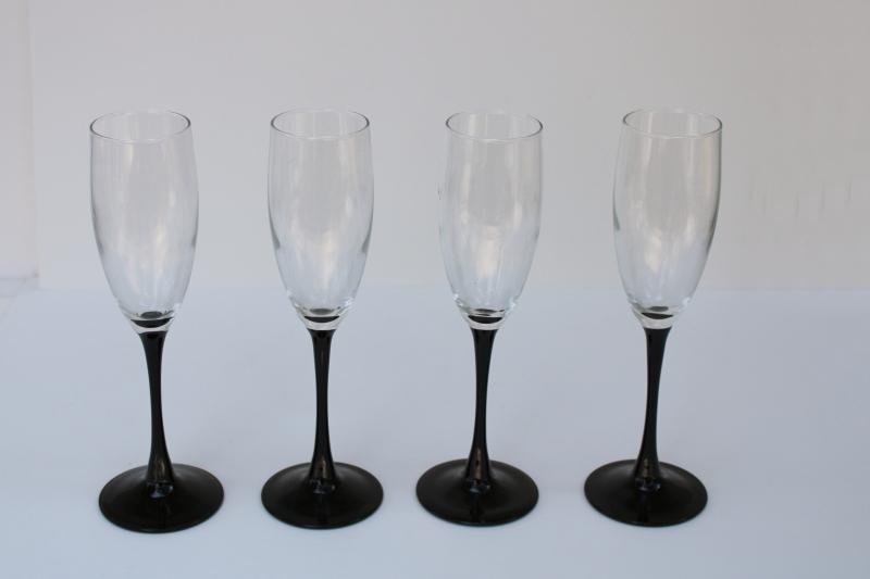 photo of Domino black stem tall champagne flutes, vintage Cristal d'Arques French crystal glasses #2