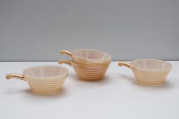 catalog photo of Fire King peach lustre luster glass stick handle soup bowls or individual casserole dishes