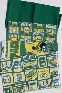 catalog photo of Green Bay Packers print fabric lot, green & gold official logo prints