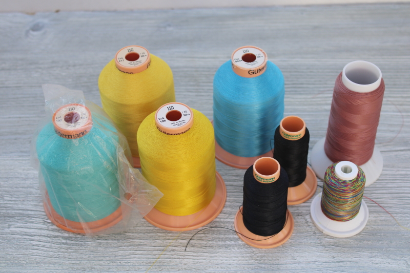 photo of Gutermann Japan cone thread lot, silky polyester machine embroidery thread Madeira type #1