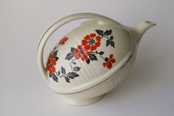 catalog photo of Hall China Specialties 1990s vintage teapot, football shape red poppy pattern 