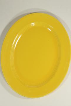 catalog photo of Harlequin Homer Laughlin china, mid-century mod serving platter in yellow