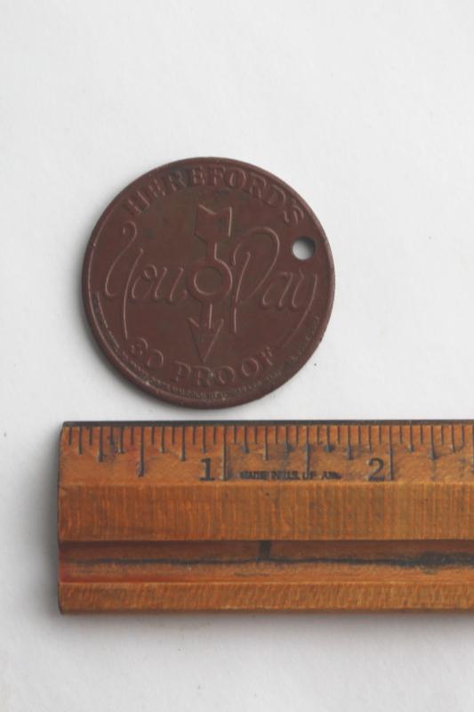 photo of Hereford's Whiskey You Pay token, tarnished copper color coin w/ Hereford cow or bull #3