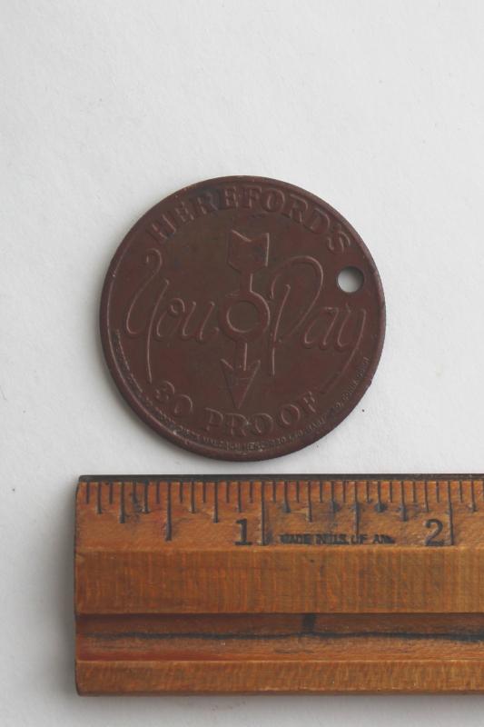 photo of Hereford's Whiskey You Pay token, tarnished copper color coin w/ Hereford cow or bull #4