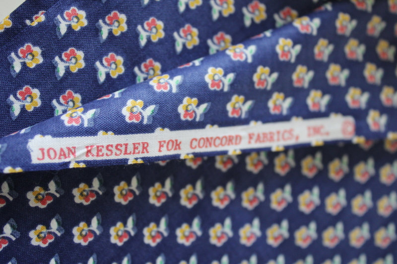 photo of Joan Kessler print Concord polished cotton fabric, tiny flowers yellow red white on navy blue #2