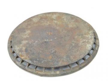 catalog photo of Large round primitive antique cast iron trivet 1911 patent