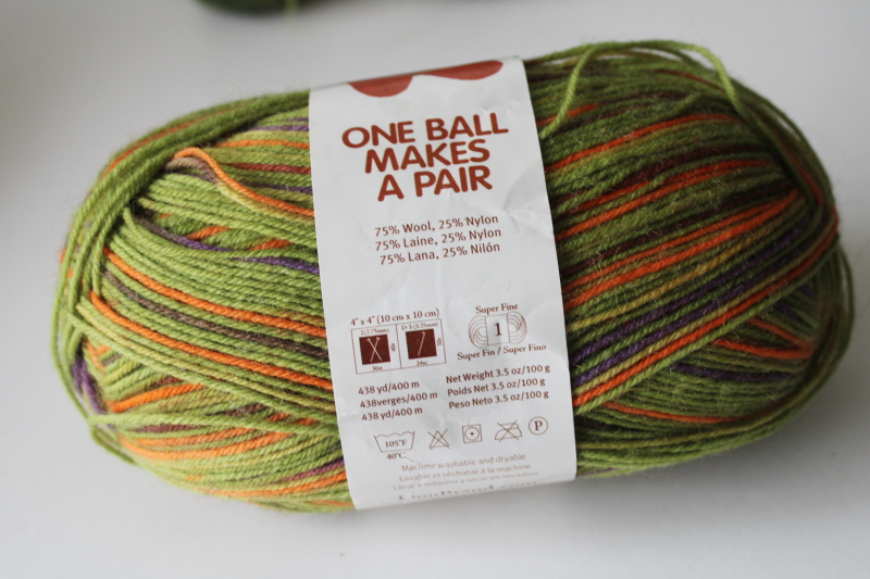 photo of Lion Brand Sock Ease wool nylon sock yarn w/ aloe, discontinued Sourball color lime green & orange  #2