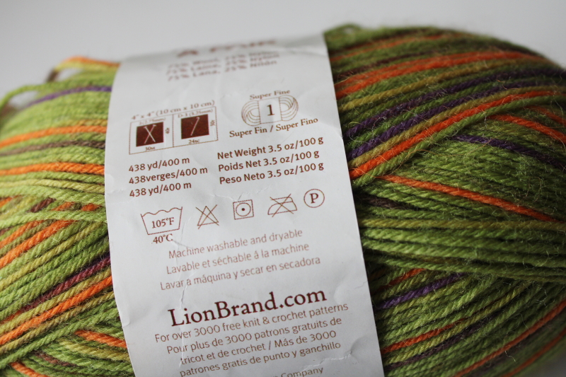 photo of Lion Brand Sock Ease wool nylon sock yarn w/ aloe, discontinued Sourball color lime green & orange  #3