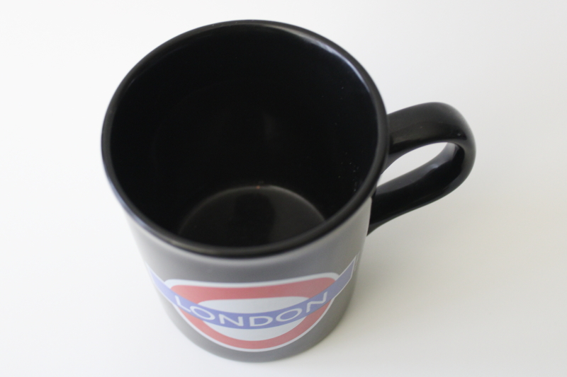 photo of London souvenir coffee cup or tea mug, underground logo on black ceramic #2