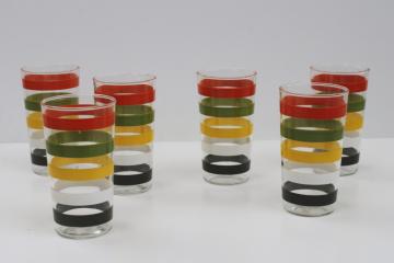 catalog photo of MCM 70s vintage drinking glasses, bold stripes in retro colors fall gold, orange, green 