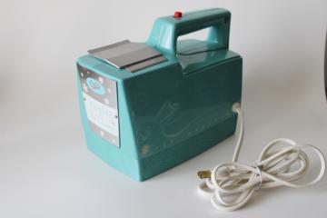 catalog photo of MCM vintage aqua Oster Snowflake ice crusher, powerful electric motor metal grinder 