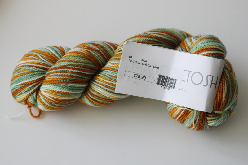 photo of Madeline Tosh sock yarn, hand dyed superwash merino wool Turtle color browns greens  #1