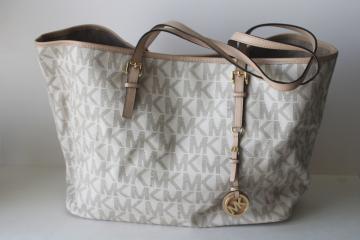 catalog photo of Michael Kors signature monogram print white bag, large purse or tote w/ brass tag 