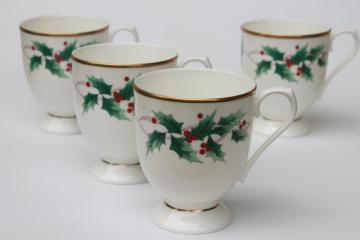 catalog photo of Mikasa Christmas Ribbon Holly holiday china coffee mugs, set of four cups