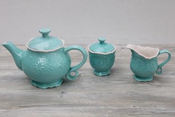 catalog photo of Pier 1 Lacy aqua blue & white tea set, hand painted Italian style ceramic w/ embossed design