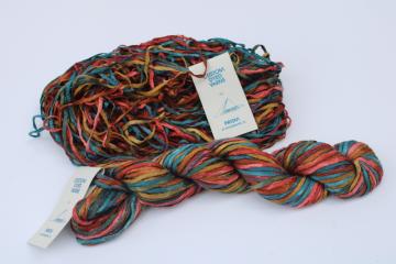 catalog photo of Prism yarns hand dyed rayon ribbon yarn southwest sunset colors rust orange coral turquoise 