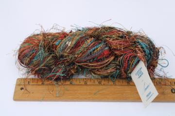 catalog photo of Prism yarns hand dyed thick & thin eyelash yarn southwest sunset colors rust orange coral turquoise 