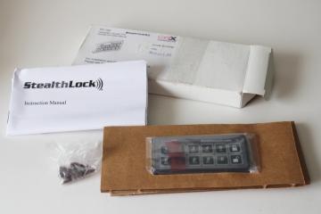 catalog photo of StealthLock TP 150 keypad, open box industrial electronic hardware w/ installation instructions 