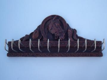catalog photo of Syroco Orna wood type composition horse and cowboy books tie rack, vintage Multi Products