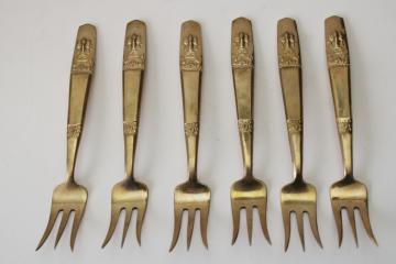catalog photo of Thailand solid brass flatware, set of six cocktail forks heavy embossed design, fancy flared shape 