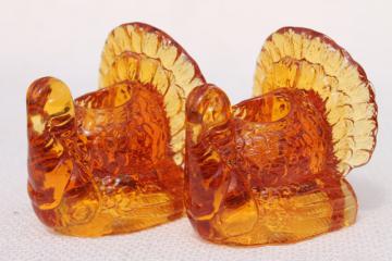 catalog photo of Thanksgiving turkey pressed glass candlesticks, pair of amber glass candle holders