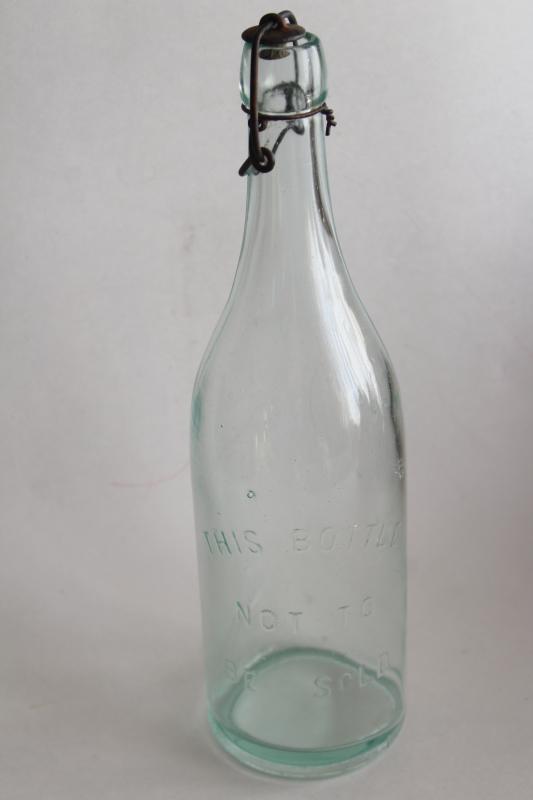 photo of This Bottle Not To Be Sold vintage bail lid embossed glass bottle #1