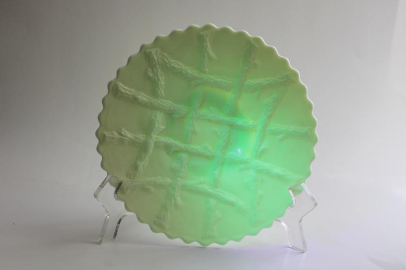 photo of UV glow vintage custard glass plate, LG Wright mark Northwood grapevine lattice pattern #5