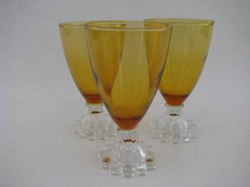 catalog photo of amber / crystal boopie footed glasses, vintage Hocking glass