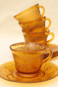 catalog photo of amber glass sandwich daisy pattern cups & saucers, vintage Tiara / Indiana glass