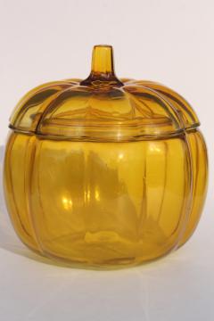 catalog photo of amber yellow pumpkin, glass cookie jar canister for fall harvest table, Halloween or Thanksgiving