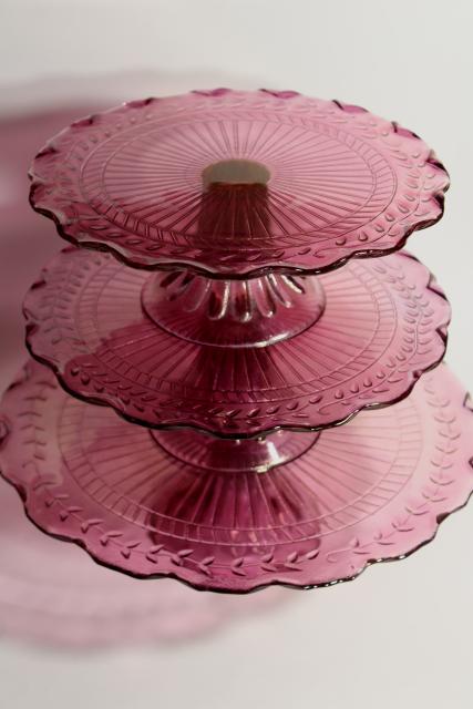 photo of amethyst pink colored glass cake stands, scalloped edge laurel vines, tower of graduated sizes #1