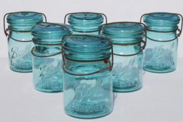 catalog photo of antique Ball mason jar storage canisters, vintage blue glass jars w/ lightning lids lot of 6