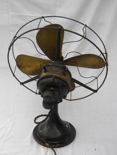 photo of antique Century 16 in brass blade oscillating fan w/wire cage and 1914 patent #3