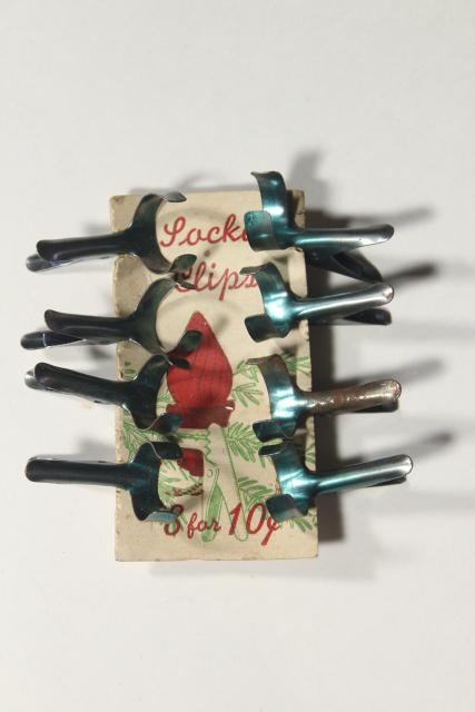 photo of antique Christmas tree light bulb holders, metal spring clips on original paper card #1