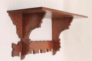 catalog photo of antique Eastlake style carved walnut wood fretwork shelf, mantel clock wall bracket 