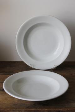 catalog photo of antique English ironstone soup plates, wide shallow bowls plain heavy white Stone China vintage farmhouse style 